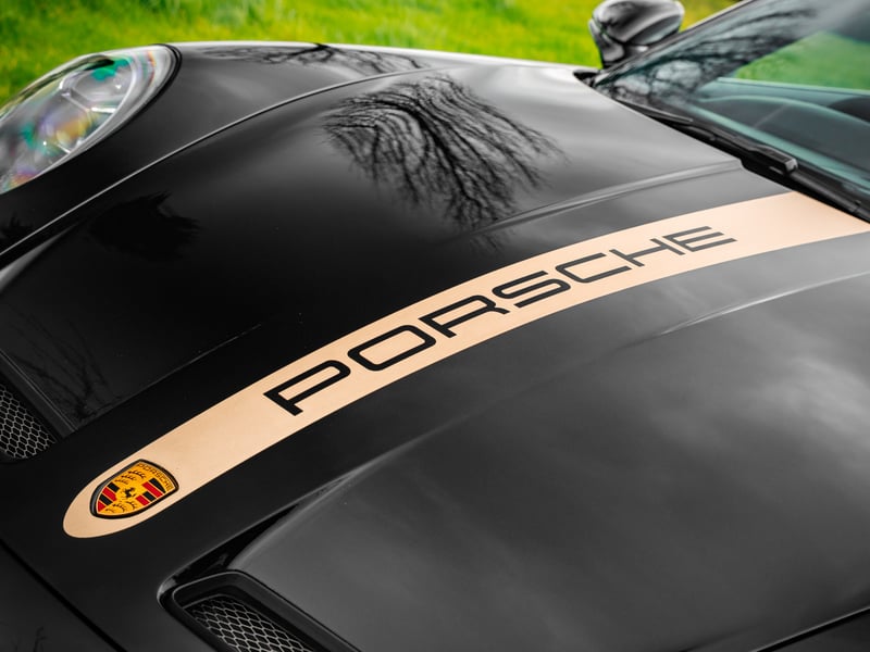 Porsche 911 GT3 or £100,000