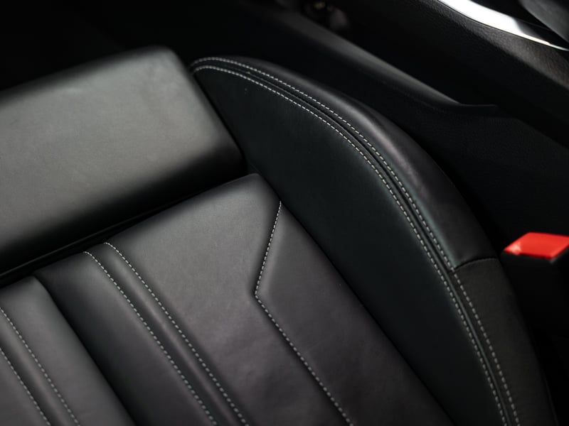 2023 Audi Q8 Etron or £25,000