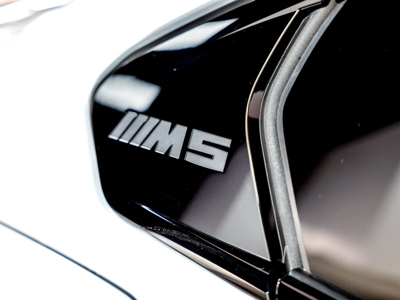 BMW M5 or £60,000