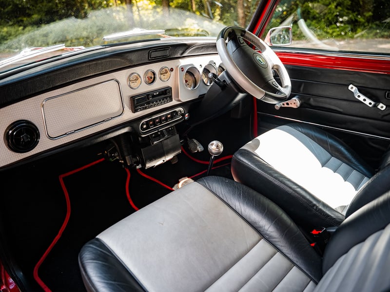 2001 Mini Cooper Sport or £15,000