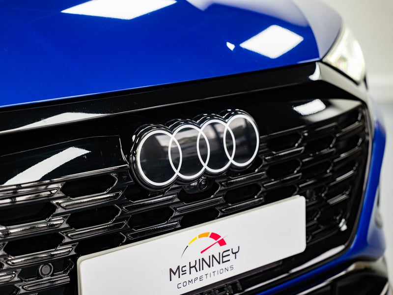 2023 Audi Q8 Etron or £25,000