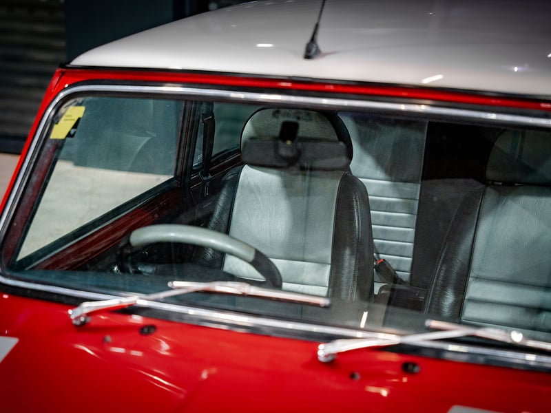 2001 Mini Cooper Sport or £15,000