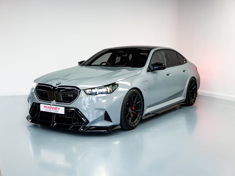 BMW M5 or £60,000