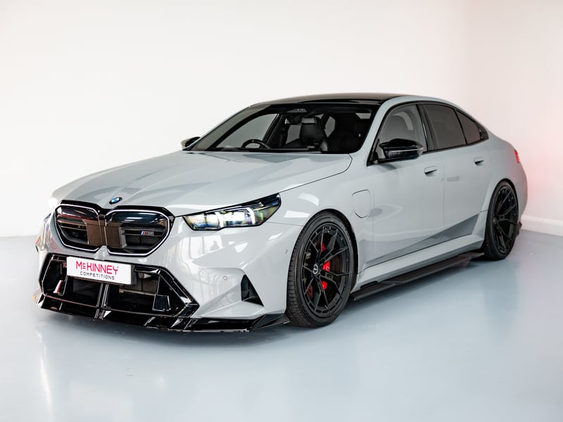 BMW M5 or £60,000