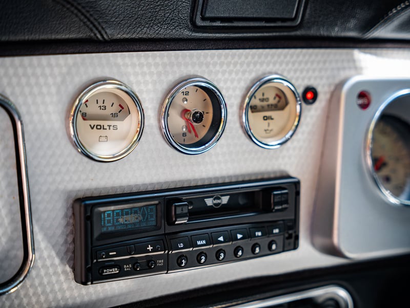 2001 Mini Cooper Sport or £15,000