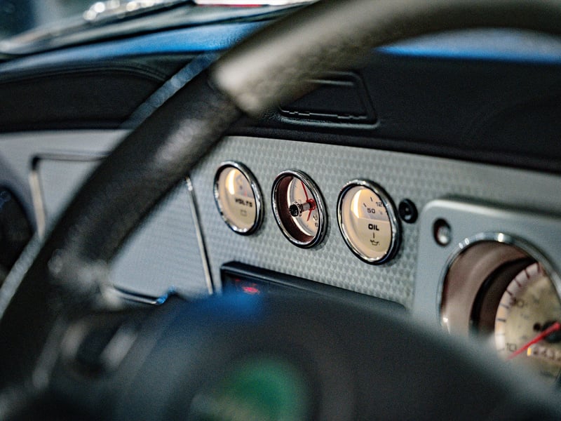 2001 Mini Cooper Sport or £15,000