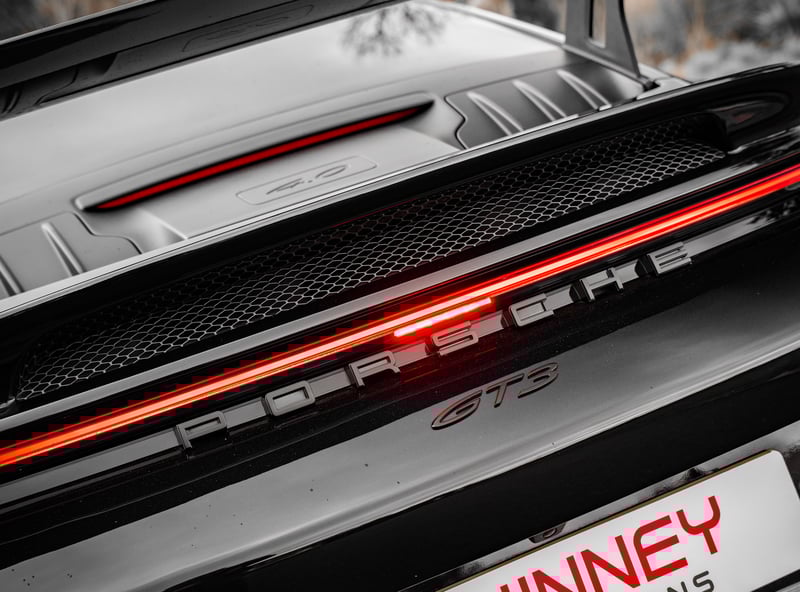 Porsche 911 GT3 or £100,000