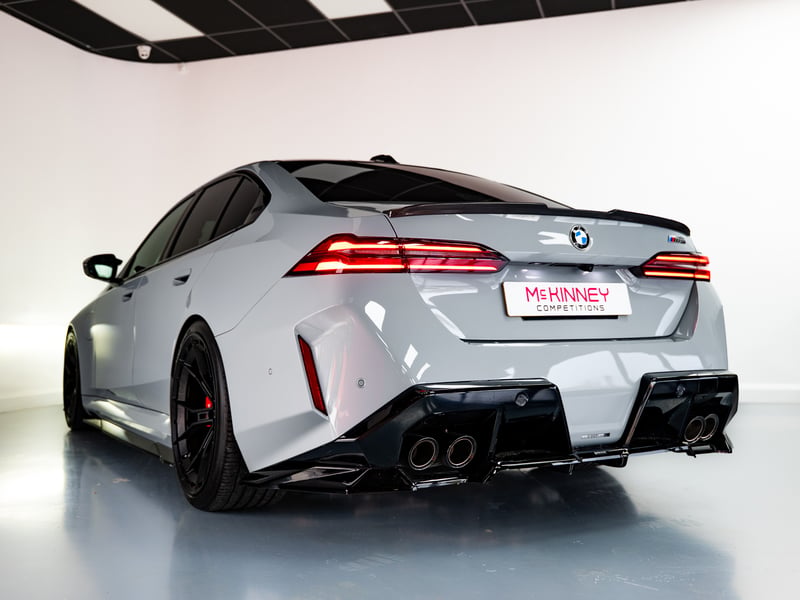 BMW M5 or £60,000