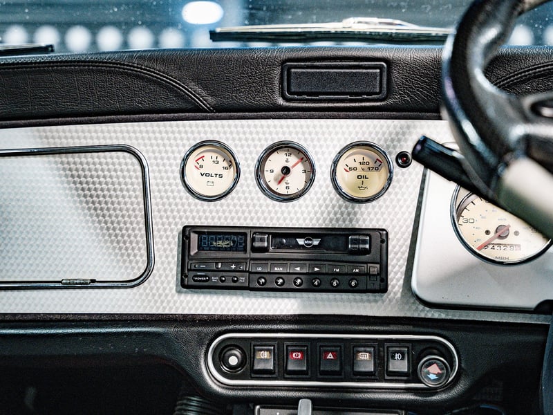 2001 Mini Cooper Sport or £15,000