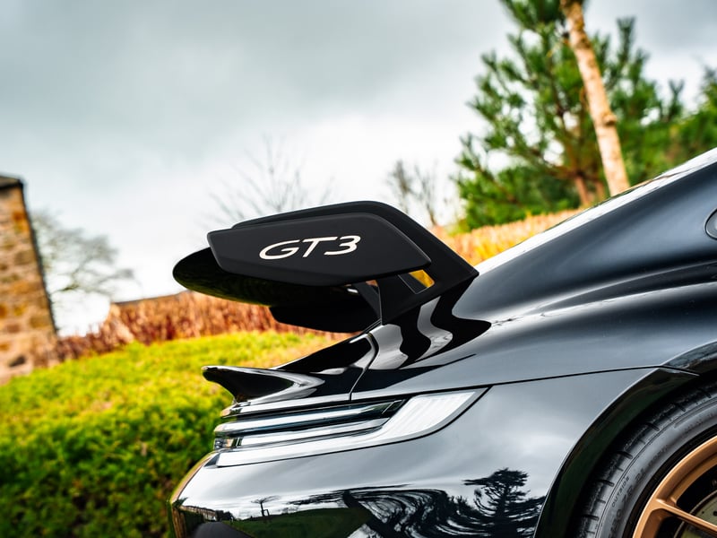 Porsche 911 GT3 or £100,000