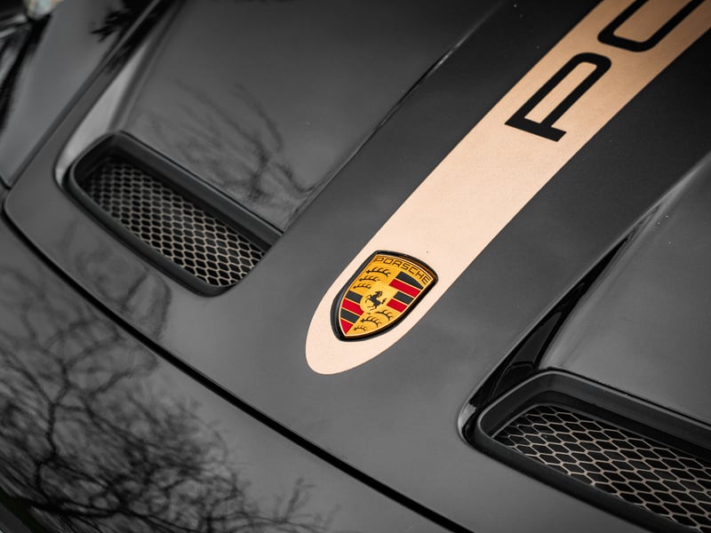 Porsche 911 GT3 or £100,000