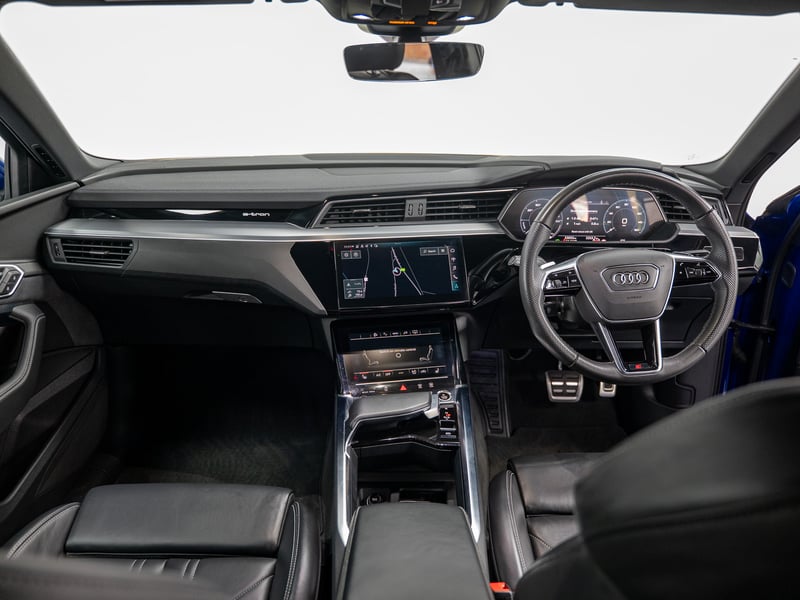 2023 Audi Q8 Etron or £25,000