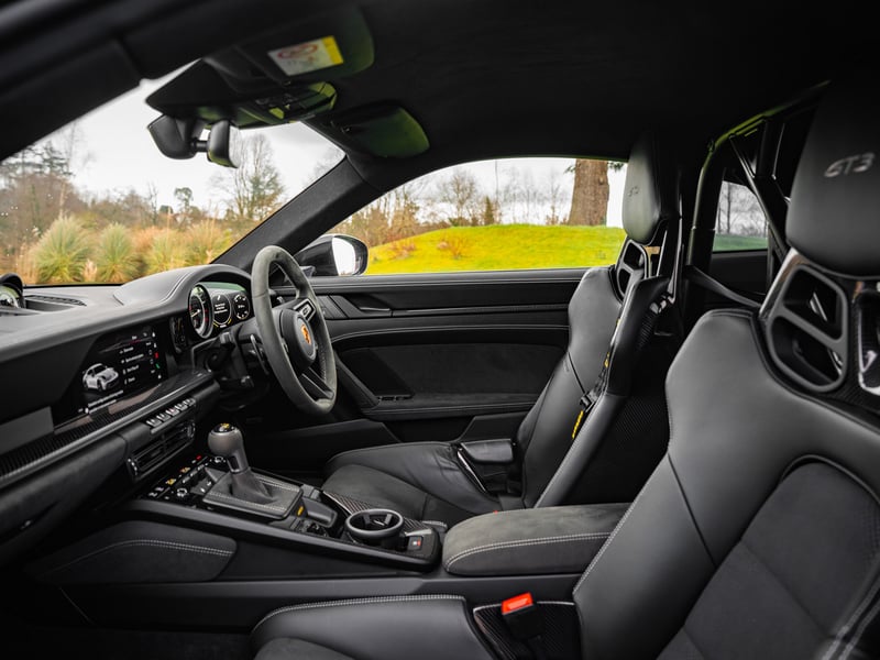 Porsche 911 GT3 or £100,000