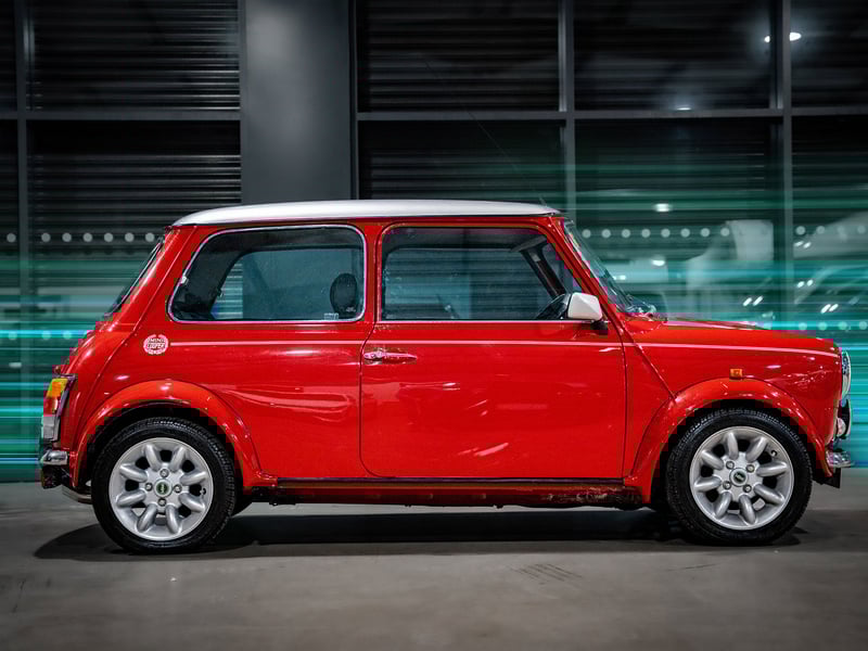 2001 Mini Cooper Sport or £15,000