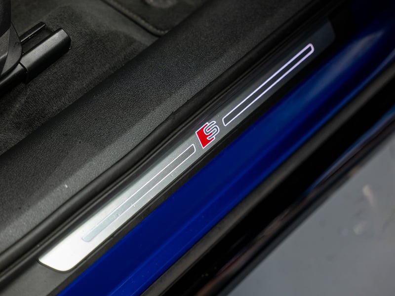 2023 Audi Q8 Etron or £25,000