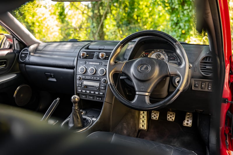 Lexus IS200 or £10,000