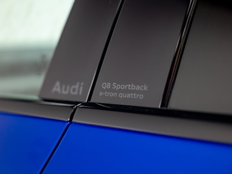 2023 Audi Q8 Etron or £25,000