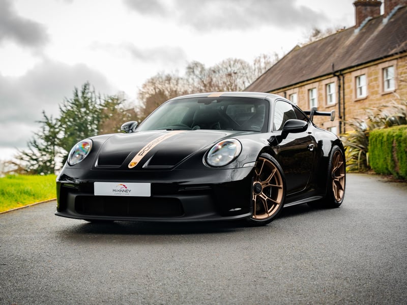 Porsche 911 GT3 or £100,000