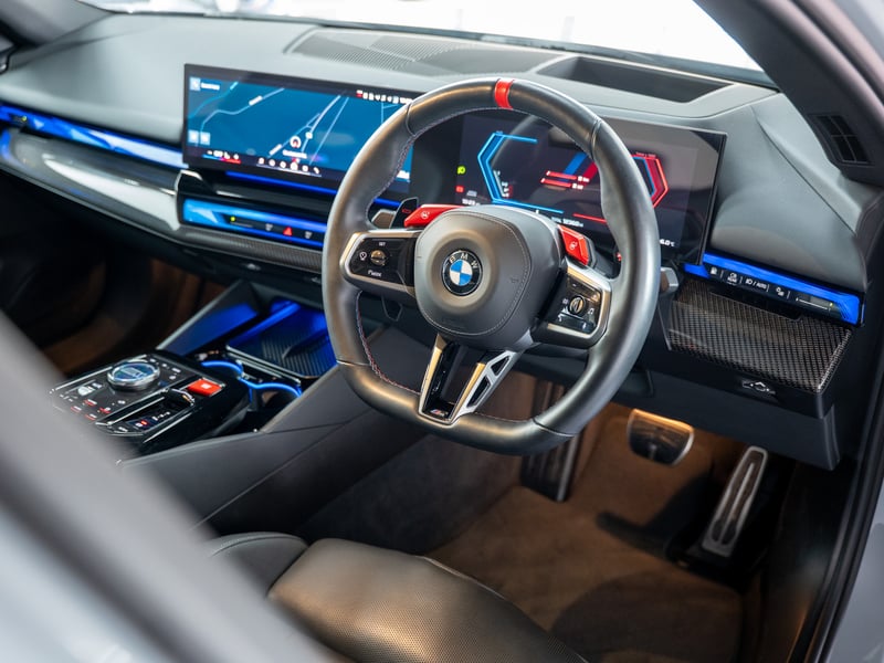 BMW M5 or £60,000
