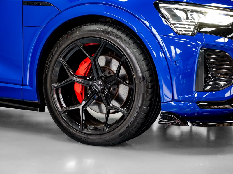 2023 Audi Q8 Etron or £25,000