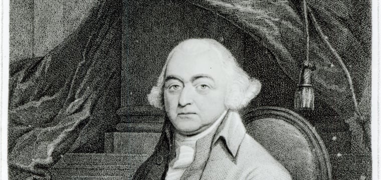 Engraved portrait of John Adams, second President of the United States, seated beside a stack of books.