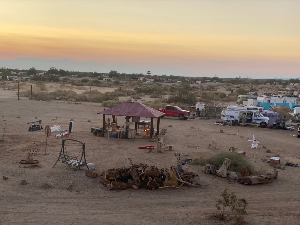 Filmmaker capturing documentary footage in Slab City