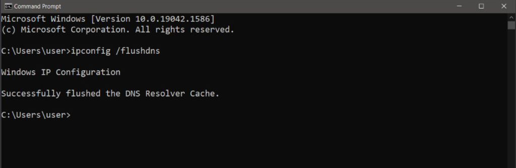 The Command Prompt window showing how to flush DNS