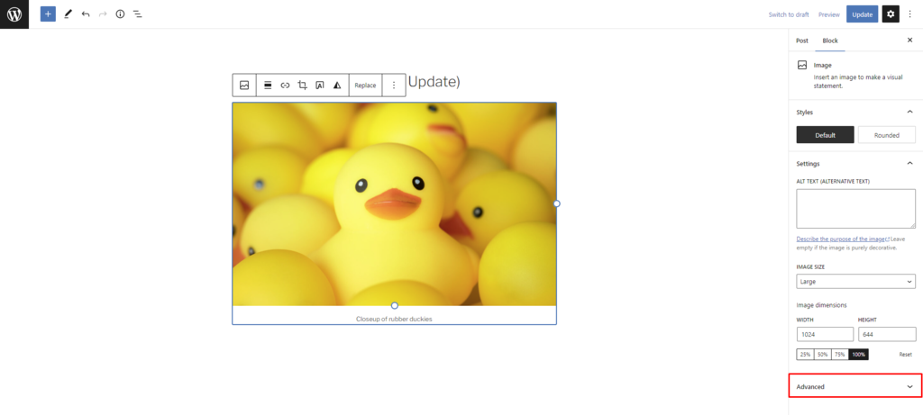 The Advanced menu location in the image block's setting to add title attribute.