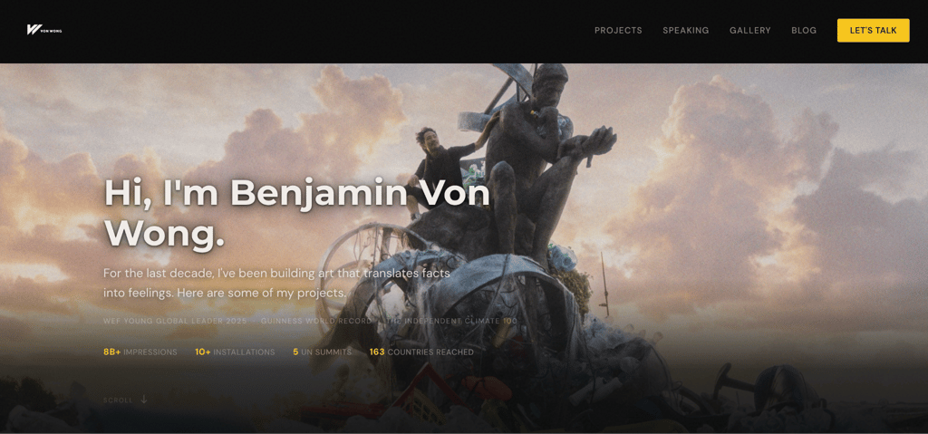benjamin-von-wong Benjamin Von Wong's homepage showing him standing atop a large waste-based art installation against a dramatic sky, with his name and tagline on the left and a stats bar showing 8 billion impressions, 10 installations, 5 UN summits, and 163 countries reached
