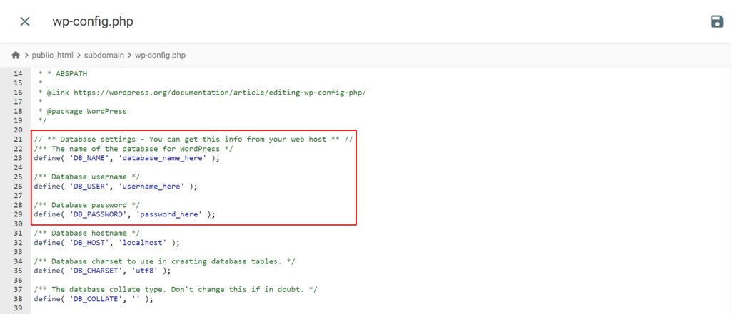 Screenshot of a wp-config.php file wp-config.php file opened and DB_NAME, DB_USER, and DB_PASSWORD strings are highlighted.