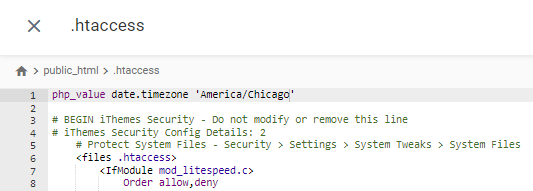 Adding the PHP set timezone code in the .htaccess file