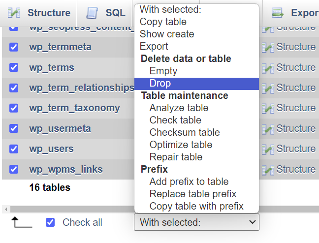 phpMyAdmin interface, highlighting the command to remove database tables