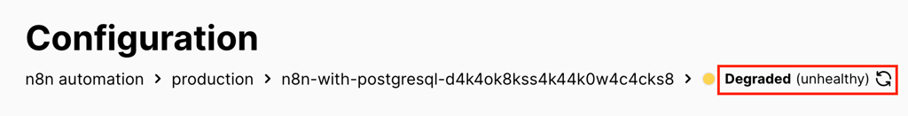 The Degraded (unhealthy) alert for n8n's container in Coolify's production page