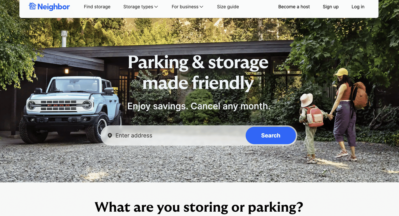 Neighbor homepage showing a driveway parking scene and the headline &ldquo;Parking & storage made friendly.&rdquo;