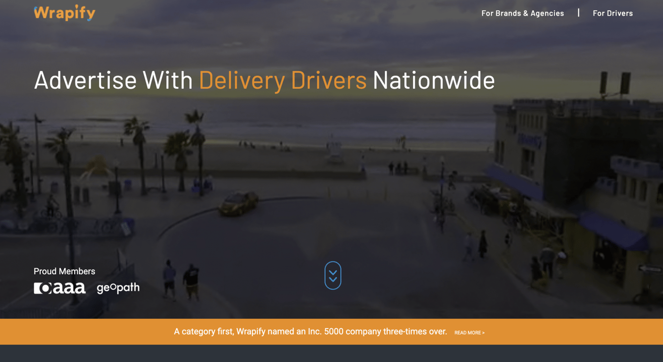 Wrapify homepage featuring a coastal scene with palm trees, beachgoers, and a car, promoting Wrapify's advertising services for delivery drivers.