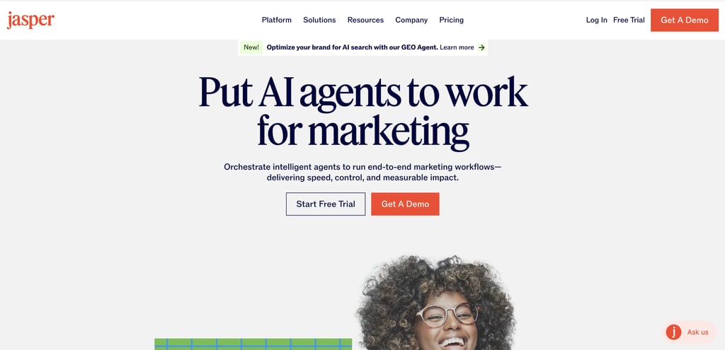 Jasper homepage featuring AI marketing agents, navigation menu, free trial and demo buttons, and a hero section promoting end-to-end AI-powered marketing workflows.