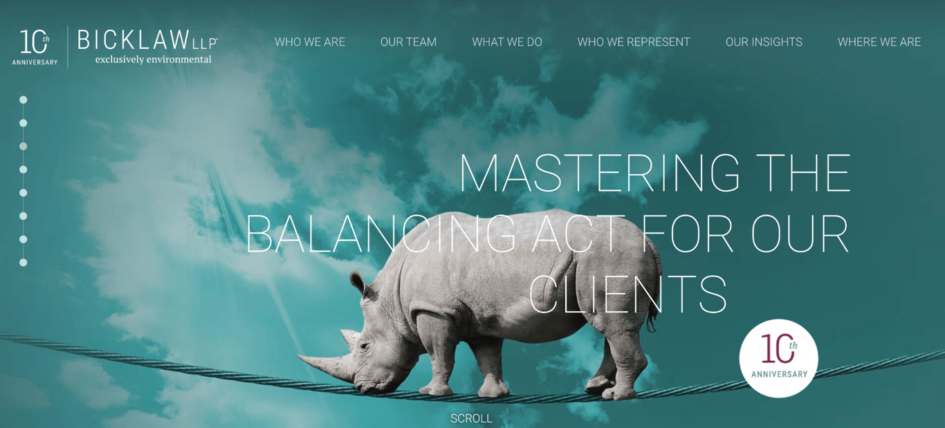 Bick Law LLP's homepage showing a rhino balancing on a tightrope wire with the headline