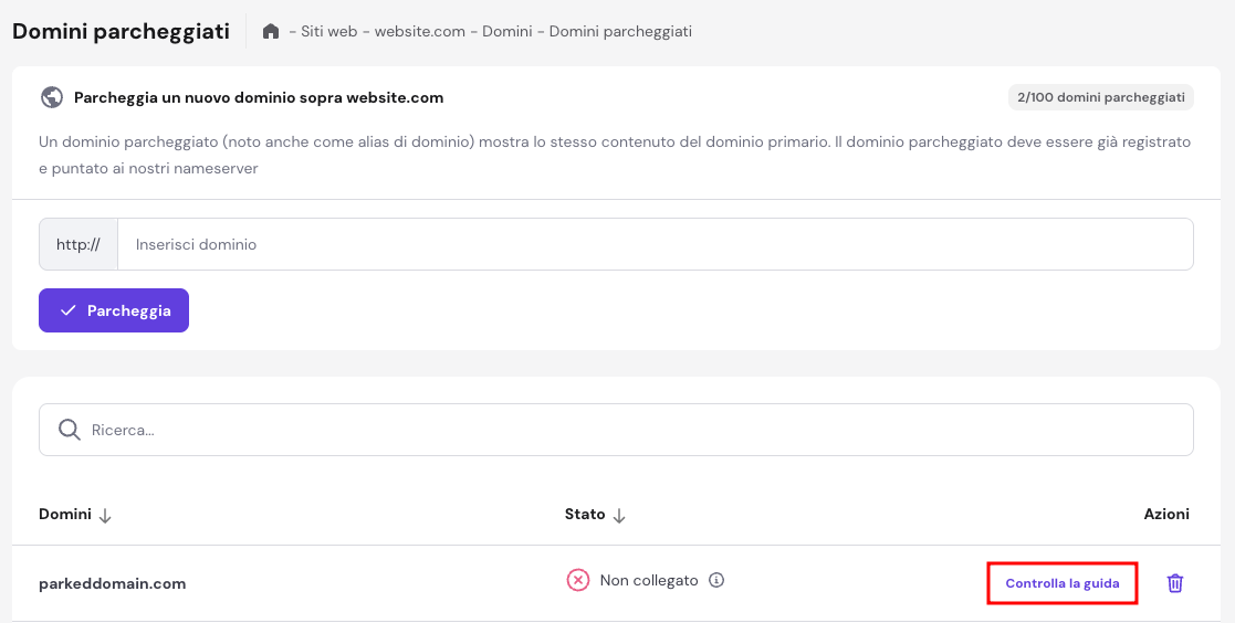 Sezione Parked Domains nella dashboard di hPanel di Hostinger, con il pulsante evidenziato per consultare la guida per completare il processo di parcheggio