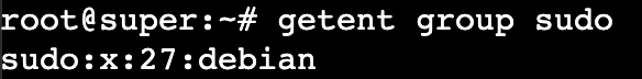 The getent command checks for users in a group