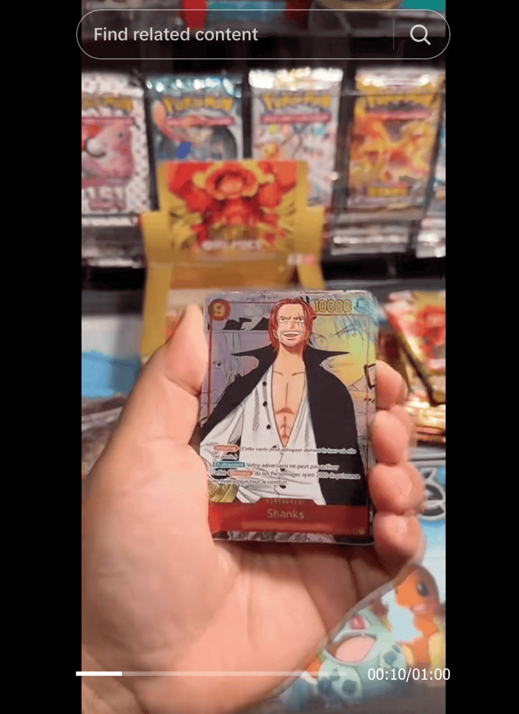 Video unboxing dari akun TikTok DG Card Game