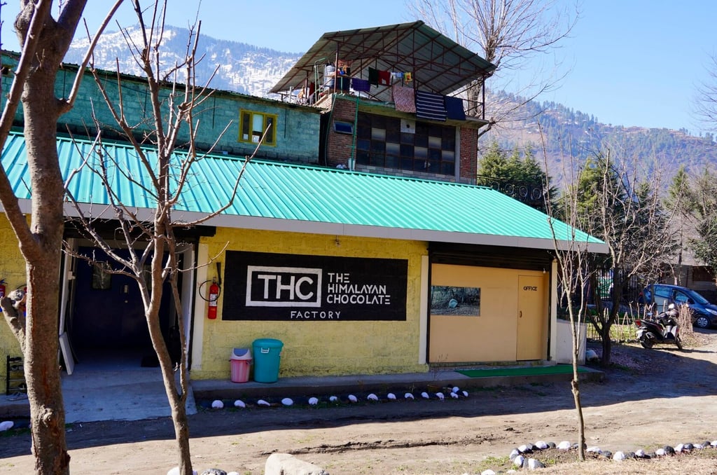 Front of The Himalayan Chocolate factory with mountains in the background