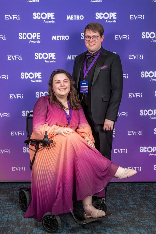 Inkfire co-founders, Imali and Cameron Chislett, at the Scope Awards 2026, smiling in front of the event backdrop.