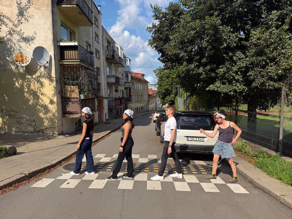 White team pulling The Beatles' pose
