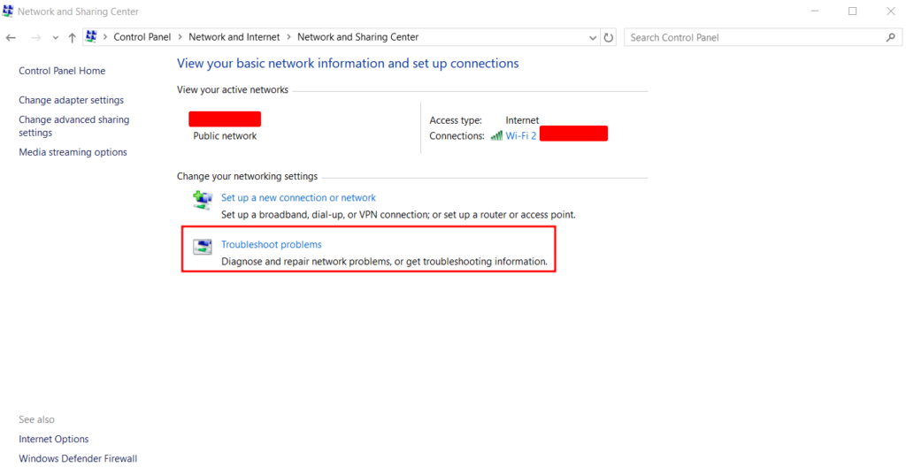La section Centre de réseau et de partage de Windows, avec les problèmes de dépannage surlignés en rouge.