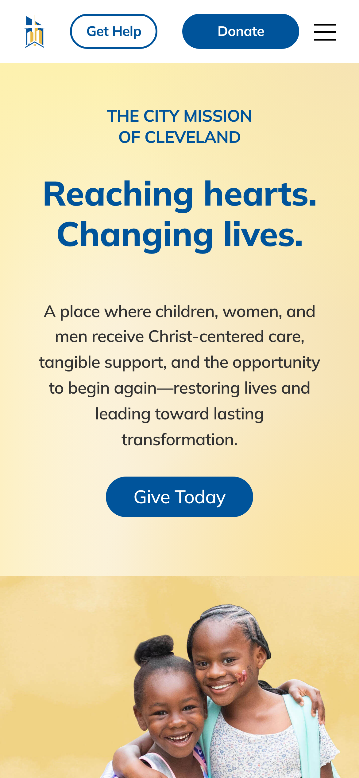 The City Mission website on a phone