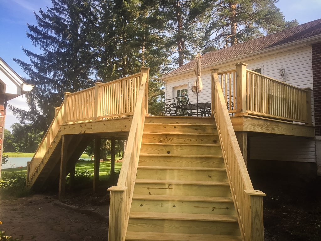 Custom raised deck with wide staircase