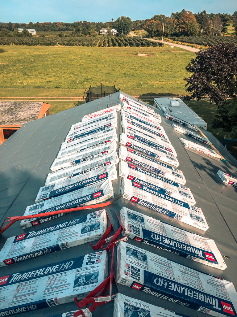 Bundles of shingles staged on a roof