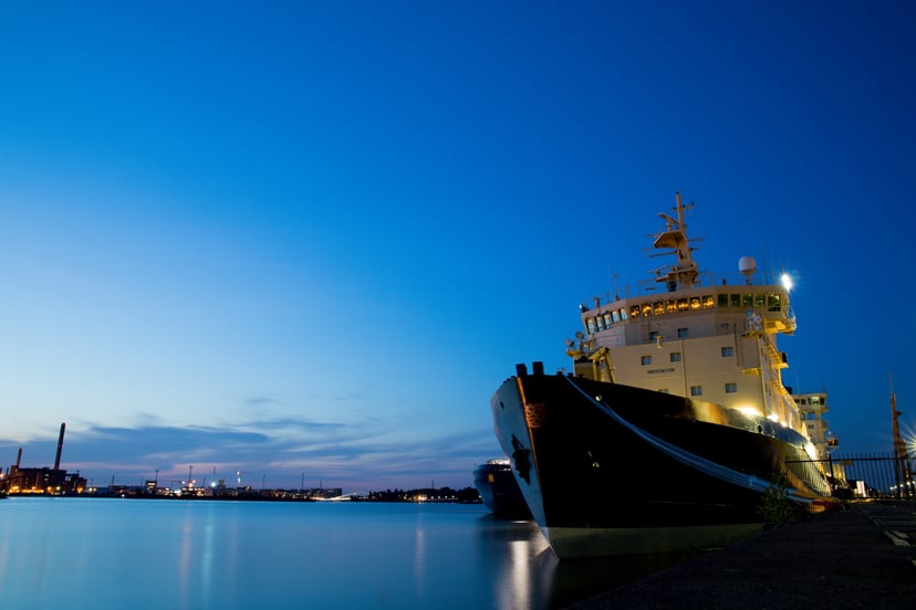 a ship under a blue sky