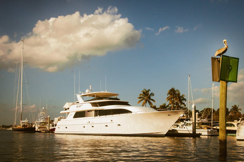 a super yacht in a marina