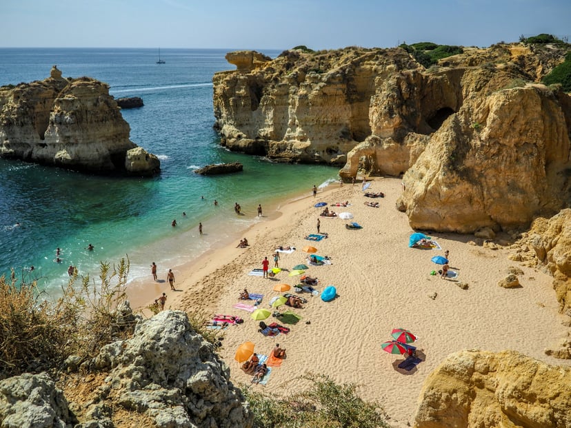 sunbathers on a beach in the Algarve